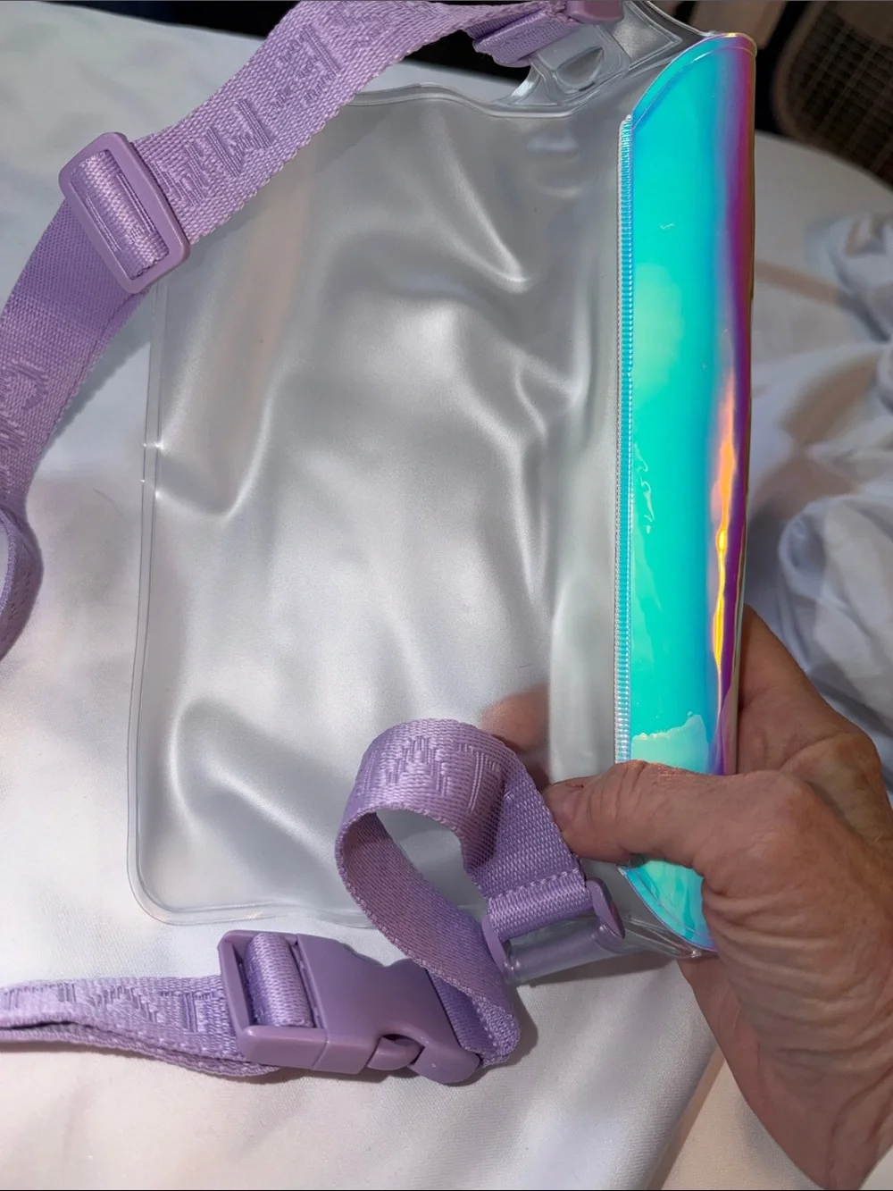 A BEAUTY-NEW case-mate Iridescent Waterproof Phone Belt Bag/Crossbody Strap.